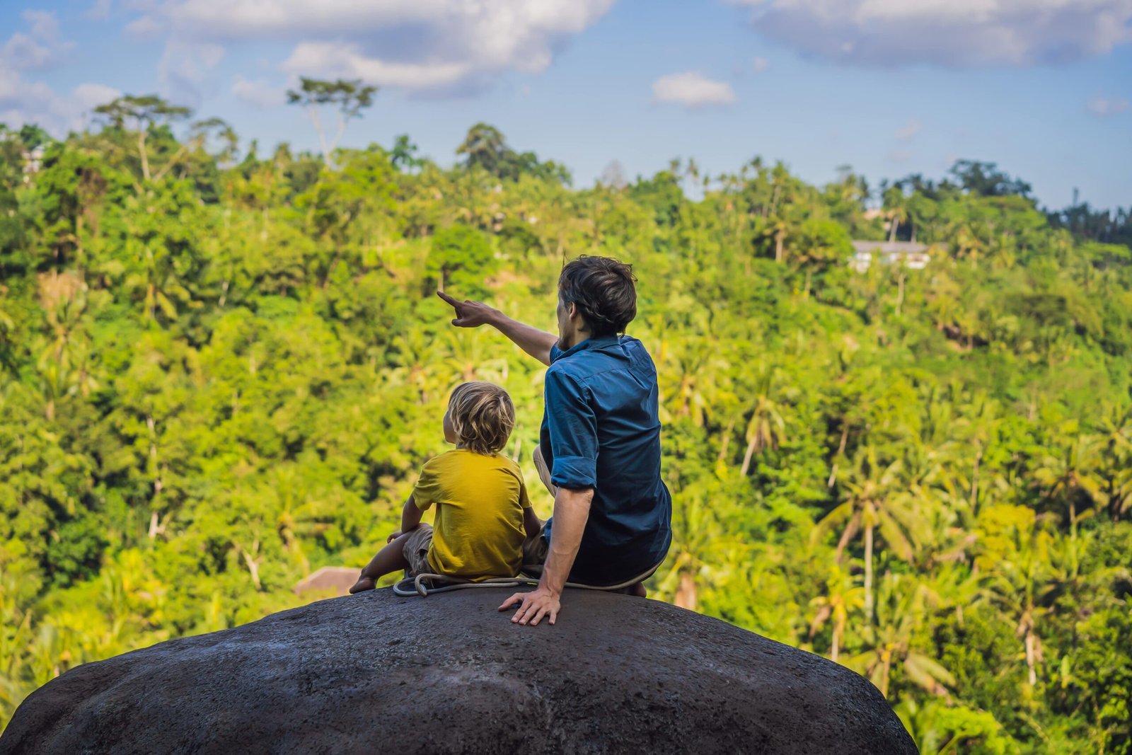 dad-son-tourists-stone-jungle-traveling-with-kids-concept-what-with-children-child-friendly-place-min